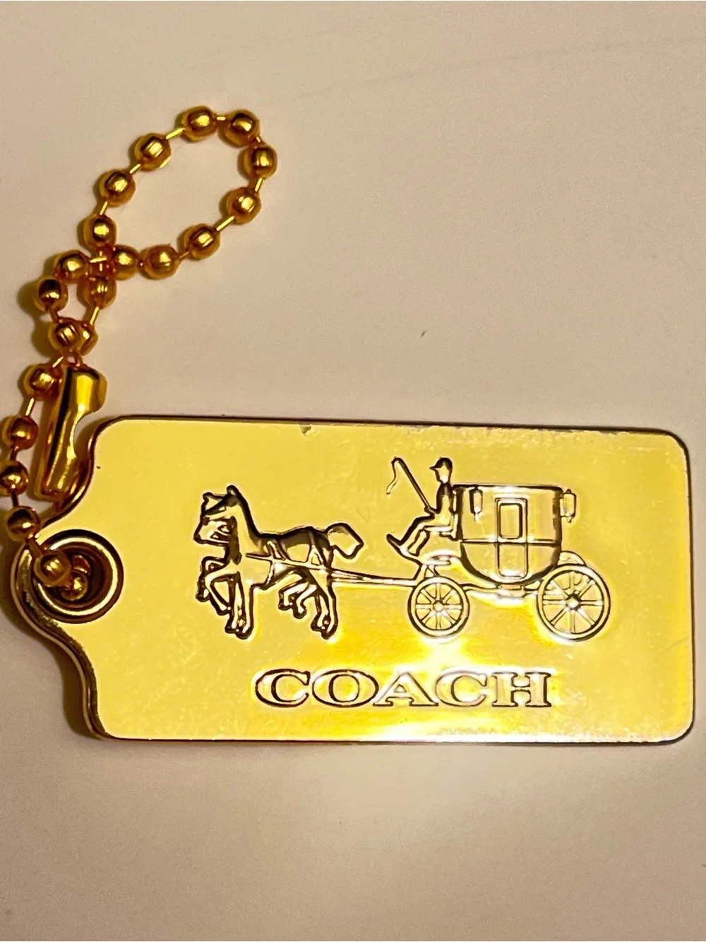 Very Rare Vintage Coach Gold Horse & Carriage Tag Key Holder and bag charm.